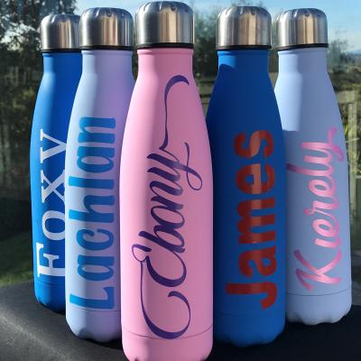 6 different coloured insulated water bottles, with silver lids and customised vinyl names printed