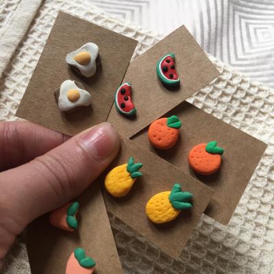 4 pairs of stud clay earrings, featuring pineapples, oranges, eggs and watermelon