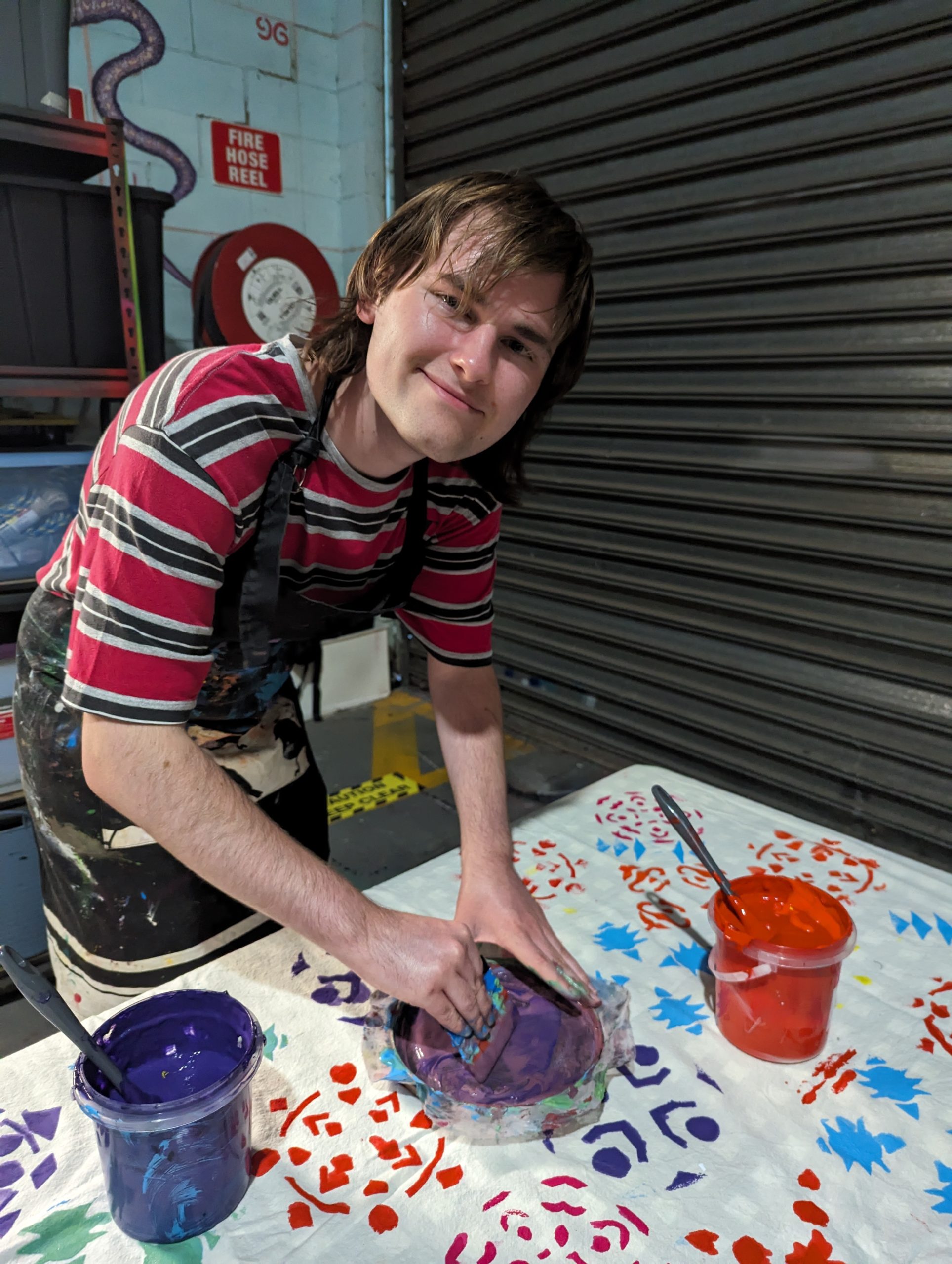 young person creating artwork